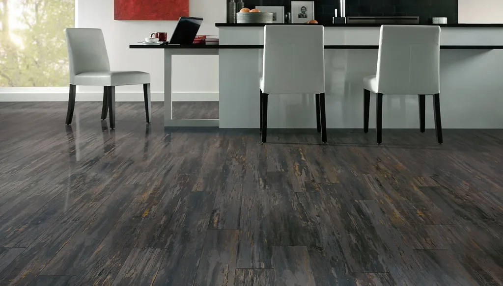 Gray wood-look plank flooring in a modern room