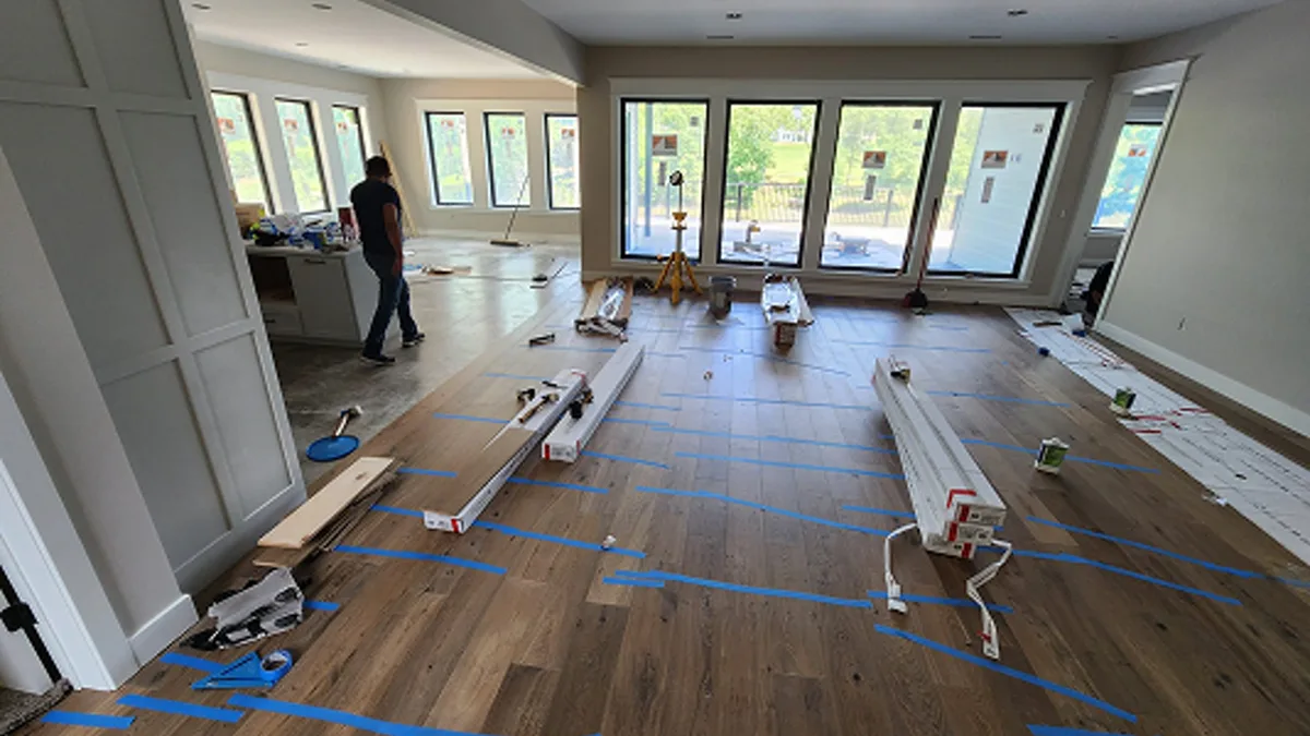 Which Direction Should Hardwood Run in a Kansas City Open Floor Plan?