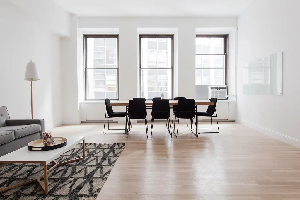 Dining table and chairs on a light hardwood floor